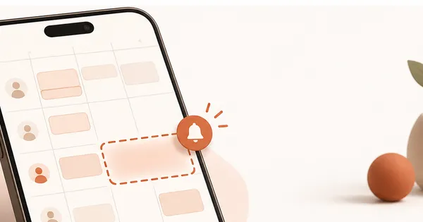 A phone showing a cancelled slot and open time on a calendar
